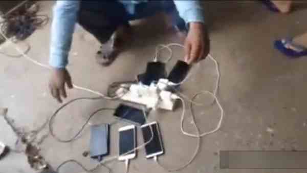 villagers gathered at railway station for mobile charging villagers gathered at railway station for mobile charging