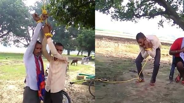 father son tied up and beaten by villagers in prayagraj father son tied up and beaten by villagers in prayagraj