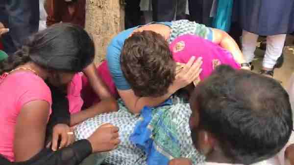 pictures of Priyanka Gandhi weeping during Sonbhadra victims family meeting pictures of Priyanka Gandhi weeping during Sonbhadra victims family meeting