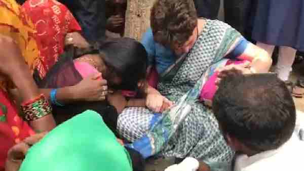 pictures of Priyanka Gandhi weeping during Sonbhadra victims family meeting pictures of Priyanka Gandhi weeping during Sonbhadra victims family meeting