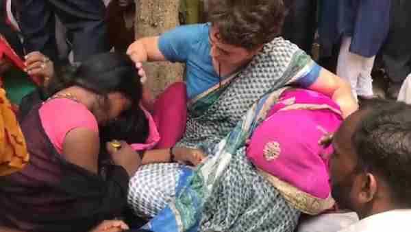 pictures of Priyanka Gandhi weeping during Sonbhadra victims family meeting pictures of Priyanka Gandhi weeping during Sonbhadra victims family meeting
