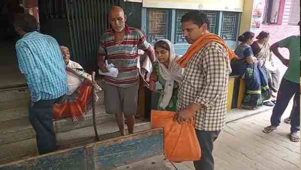 old man peddles cycle rickshaw carrying her wife for treatment old man peddles cycle rickshaw carrying her wife for treatment