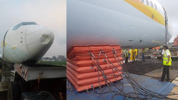 Mumbai: SpiceJet plane pulls back by Air India teams who stuck on airport runway Mumbai: SpiceJet plane pulls back by Air India teams who stuck on airport runway