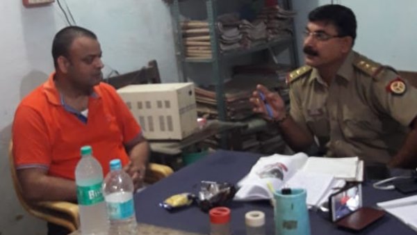policeman offers water and biscuits to murder accused in police station policeman offers water and biscuits to murder accused in police station