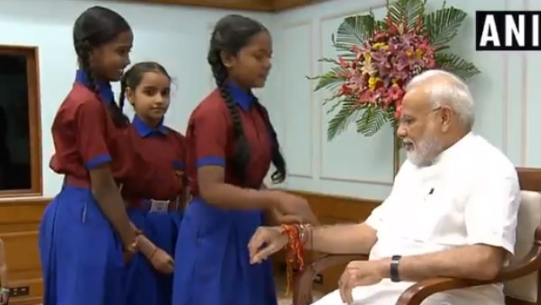 Raksha Bandhan 2019 Women and children tie rakhi to PM Narendra Modi in delhi Raksha Bandhan 2019 Women and children tie rakhi to PM Narendra Modi in delhi