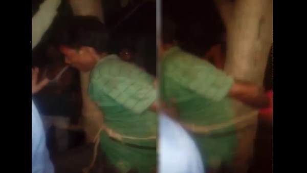 man tied with the tree and beaten brutally by mob man tied with the tree and beaten brutally by mob