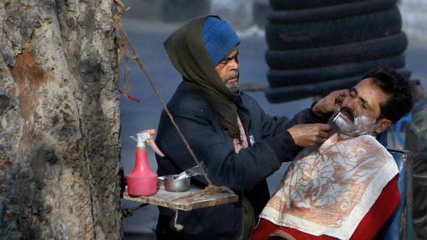Major scarcity of barbers in Kashmir, locals making big money when outsiders return home Major scarcity of barbers in Kashmir, locals making big money when outsiders return home