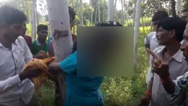 woman beaten by villagers suspicious in child lifter woman beaten by villagers suspicious in child lifter