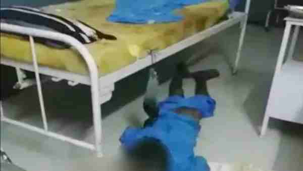 patient was lying unconscious on floor near bed patient was lying unconscious on floor near bed