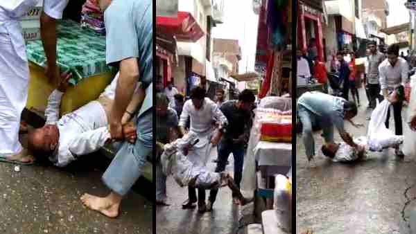 Father and son beaten a old man video viral Father and son beaten a old man video viral