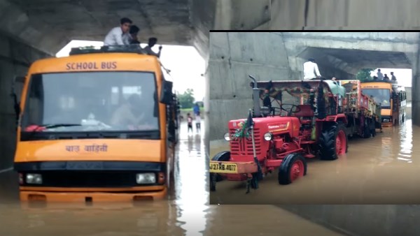 Bus stuck in kurabad underpass, children saved life by climbing on roof Bus stuck in kurabad underpass, children saved life by climbing on roof