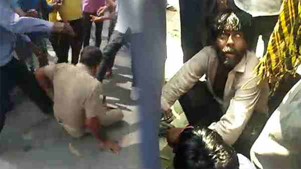 mob attack on parents of sick child child thief mob attack on parents of sick child child thief