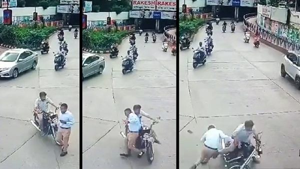 biker hits the crime-branch PSI in rajkot, video goes to viral biker hits the crime-branch PSI in rajkot, video goes to viral