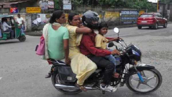 गोद में बच्चे को भी माना जा सकता है तीसरी सवारी