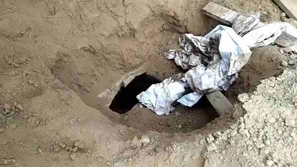 woman body found outside grave woman body found outside grave
