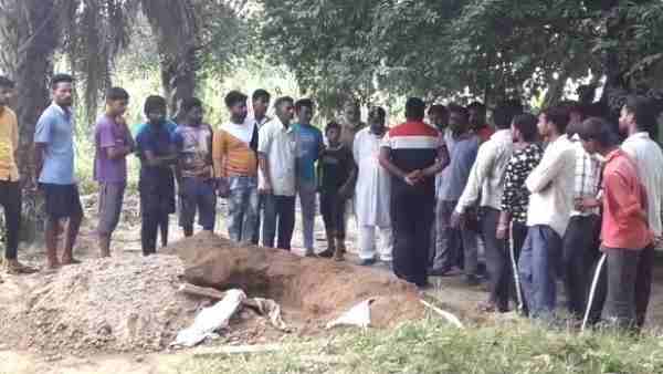 woman body found outside grave woman body found outside grave