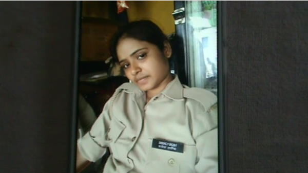 A woman policeman hanging in police station A woman policeman hanging in police station