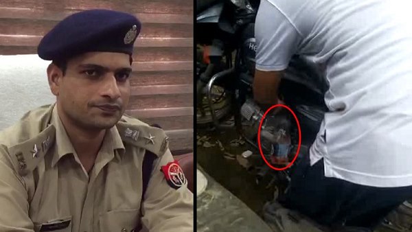 Video of policeman viral thieving petrol from bike Video of policeman viral thieving petrol from bike