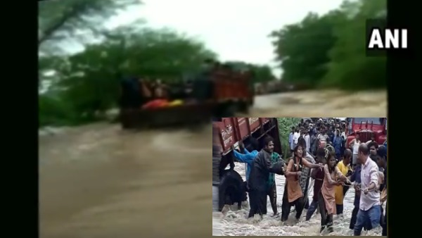 Dungarpur Schhool children Saved from truck in Flood on road Dungarpur Schhool children Saved from truck in Flood on road