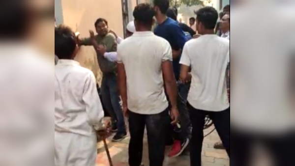 saharanpur junior engineer beaten by villagers in deoband video viral saharanpur junior engineer beaten by villagers in deoband video viral