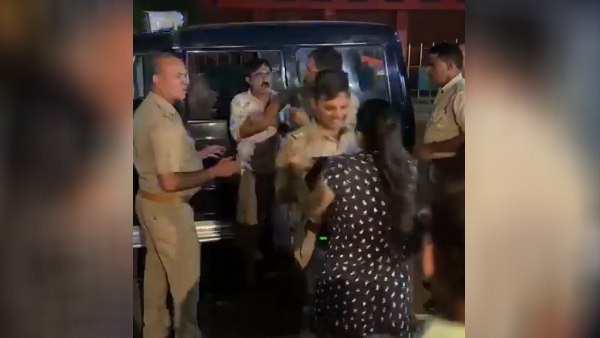 दरोगा और महिला के पति के बीच कहासुनी
