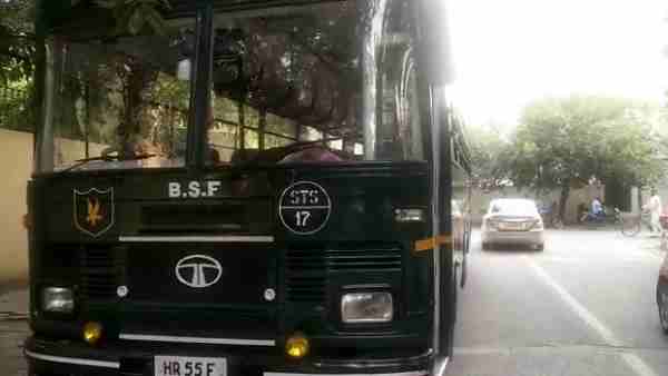 Woman died on the road after bsf bus hit scooty Woman died on the road after bsf bus hit scooty