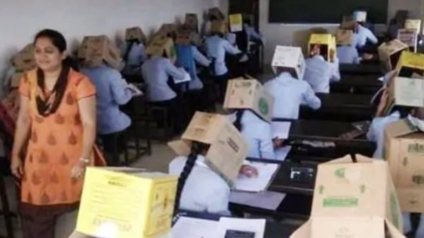 students at a private college in Karnataka wear cardboard boxes during an exam Stop Them from Cheating students at a private college in Karnataka wear cardboard boxes during an exam Stop Them from Cheating