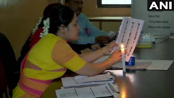 voting in candle light and rain in maharashtra voting in candle light and rain in maharashtra
