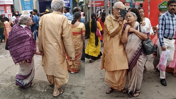 photo of elderly couple happily pandal hopping viral on social media photo of elderly couple happily pandal hopping viral on social media