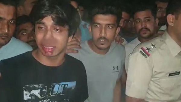 policeman beaten to a man for car parking in rajasthan policeman beaten to a man for car parking in rajasthan