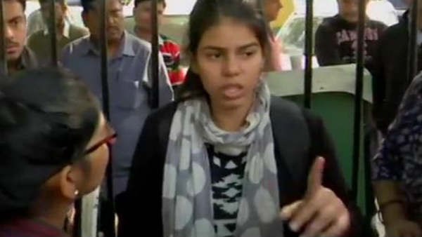 Hyderabad Gangrape-Murder Case: Girl Protests Outside Parliament Detained By Police. Hyderabad Gangrape-Murder Case: Girl Protests Outside Parliament Detained By Police.