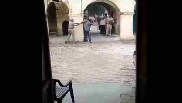 Video of youth beating up in police station goes viral Video of youth beating up in police station goes viral