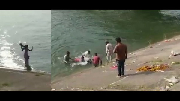 watch video: girl jumps at narmada canal for suicide, people save him watch video: girl jumps at narmada canal for suicide, people save him