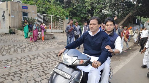 Congress leader Jyotiraditya Scindia seen walking without helmet on scooter Congress leader Jyotiraditya Scindia seen walking without helmet on scooter
