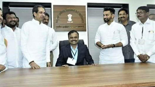 When CM Uddhav Thackeray stand up and a tehsildar sit on the Chair, People praising Thackeray for his modesty When CM Uddhav Thackeray stand up and a tehsildar sit on the Chair, People praising Thackeray for his modesty