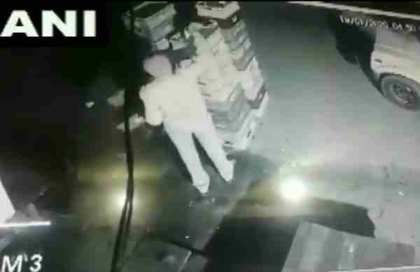 Policeman seen stealing packets of milk in Noida Policeman seen stealing packets of milk in Noida