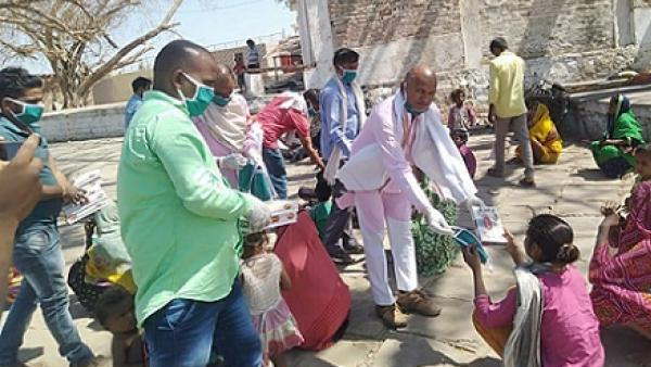 Villager gave food to hungry people Villager gave food to hungry people