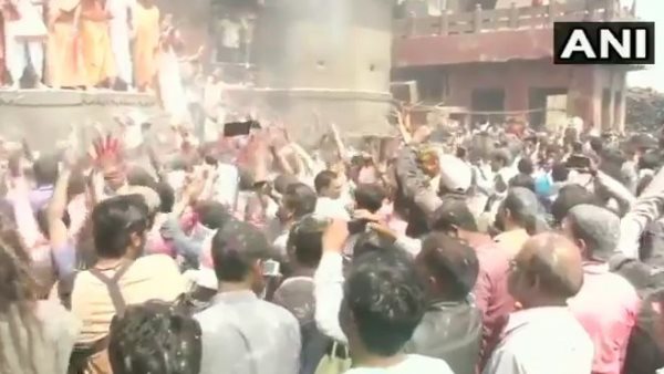 People at Varanasi Manikarnika Ghat celebrate Holi smear pyre ash on each other People at Varanasi Manikarnika Ghat celebrate Holi smear pyre ash on each other