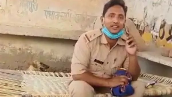 police inspector drinking beer during lockdown in mainpuri police inspector drinking beer during lockdown in mainpuri