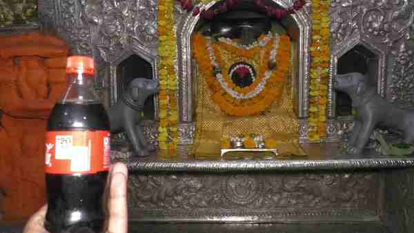 Cold drink for Baba Batuk Bhairav in heat wave in temple of varanasi Cold drink for Baba Batuk Bhairav in heat wave in temple of varanasi