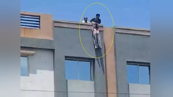 In valsad, a 17 year-old Girl Hanging on 4th floor Apartment railing, Rescued by men In valsad, a 17 year-old Girl Hanging on 4th floor Apartment railing, Rescued by men