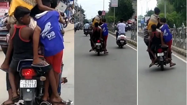 watch: a man drive motorcycle with five children in covid-19 lockdown at bharuch, video goes to viral watch: a man drive motorcycle with five children in covid-19 lockdown at bharuch, video goes to viral