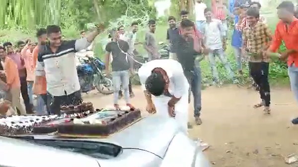 BJP Youth Front leader cuts cake with sword, celebrates with beer BJP Youth Front leader cuts cake with sword, celebrates with beer