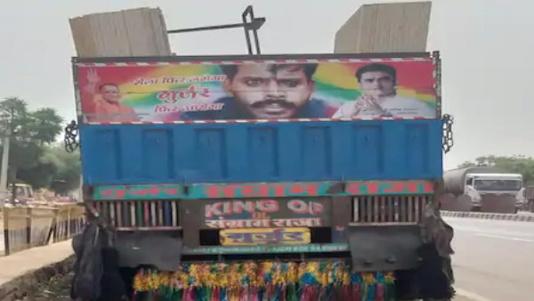 नेशनल हाईवे 21 पर ट्रक के पीछे ली गई तस्वीर