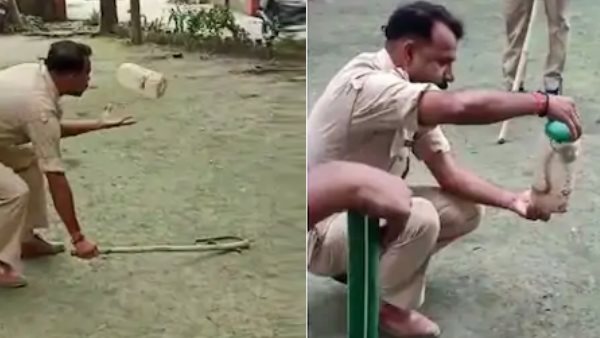 policeman caught snake in police station in pratapgarh policeman caught snake in police station in pratapgarh