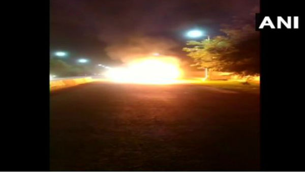 Noida: A moving car catches fire in Transport Nagar area of Sector-67, driver jumps out of the car to save life. Noida: A moving car catches fire in Transport Nagar area of Sector-67, driver jumps out of the car to save life.