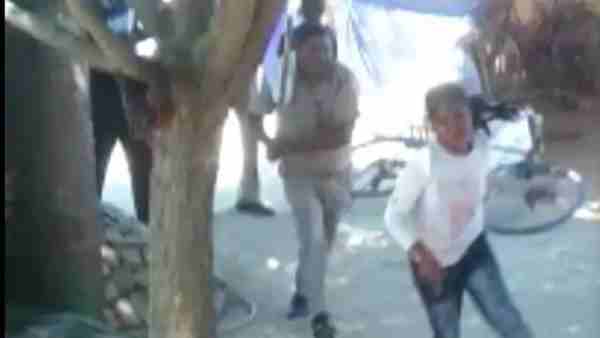 up policemen beat up and run behind girls in Jaunpur district up policemen beat up and run behind girls in Jaunpur district
