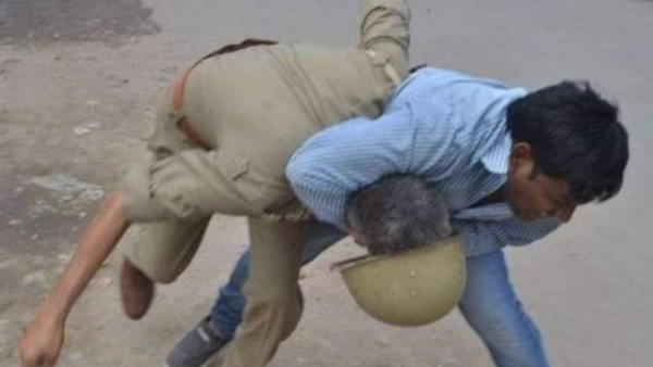 fact check a picture man beaten policeman not from bengal violence fact check a picture man beaten policeman not from bengal violence