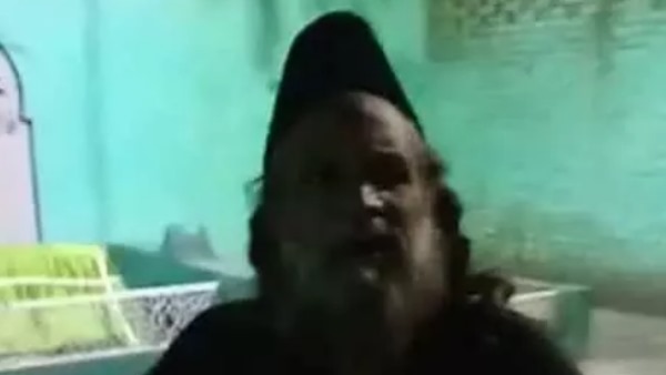 baba handcuffed by police for running illegal racket inside mazar in lucknow baba handcuffed by police for running illegal racket inside mazar in lucknow