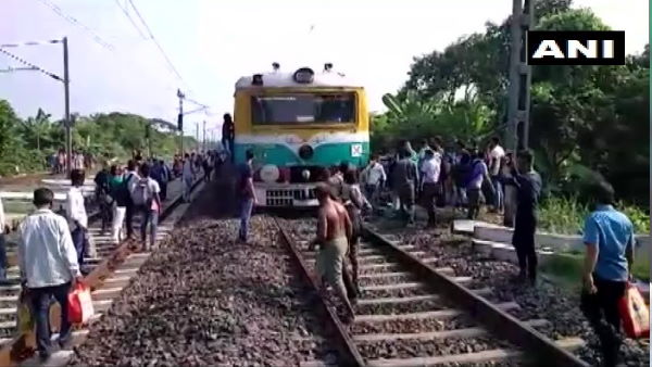 West Bengal: People blocked railway tracks at Chuchura station demanding train services for everyone West Bengal: People blocked railway tracks at Chuchura station demanding train services for everyone